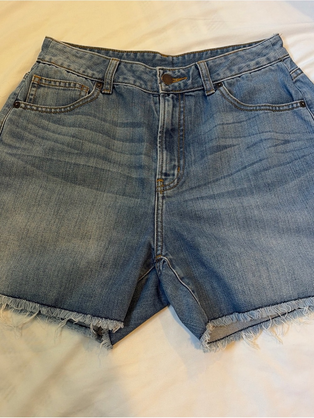 High-Rise Light Blue Denim Jean Shorts with Frayed Hem